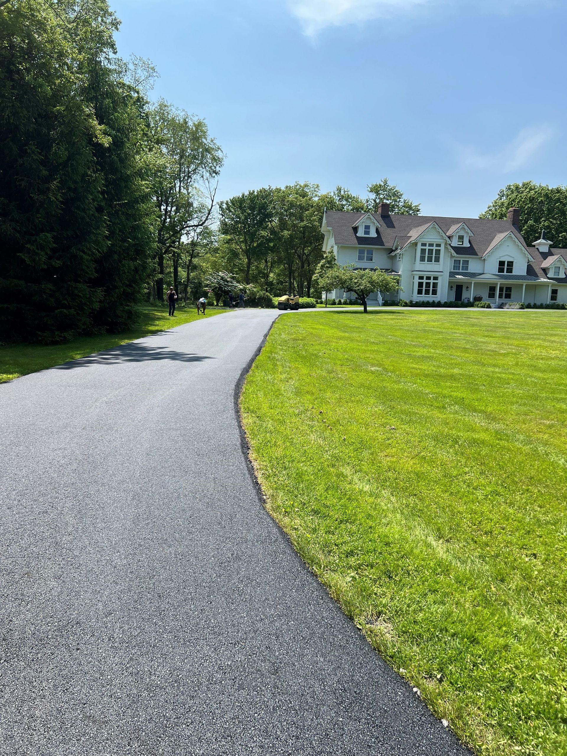 Oil-and-chip blacktop finish after resurfacing — improved grip and longevity