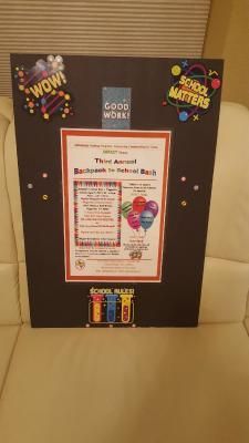 Bulletin board with an event poster for 