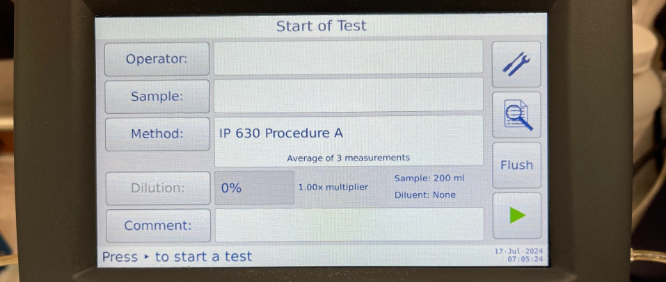 A computer screen shows the start of a test