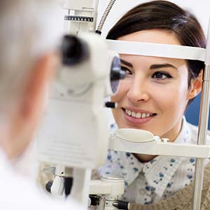 Contacts — Woman Look in Ophthalmoscope in Lawton, OK