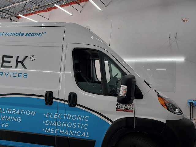 A white van with the word ek on it