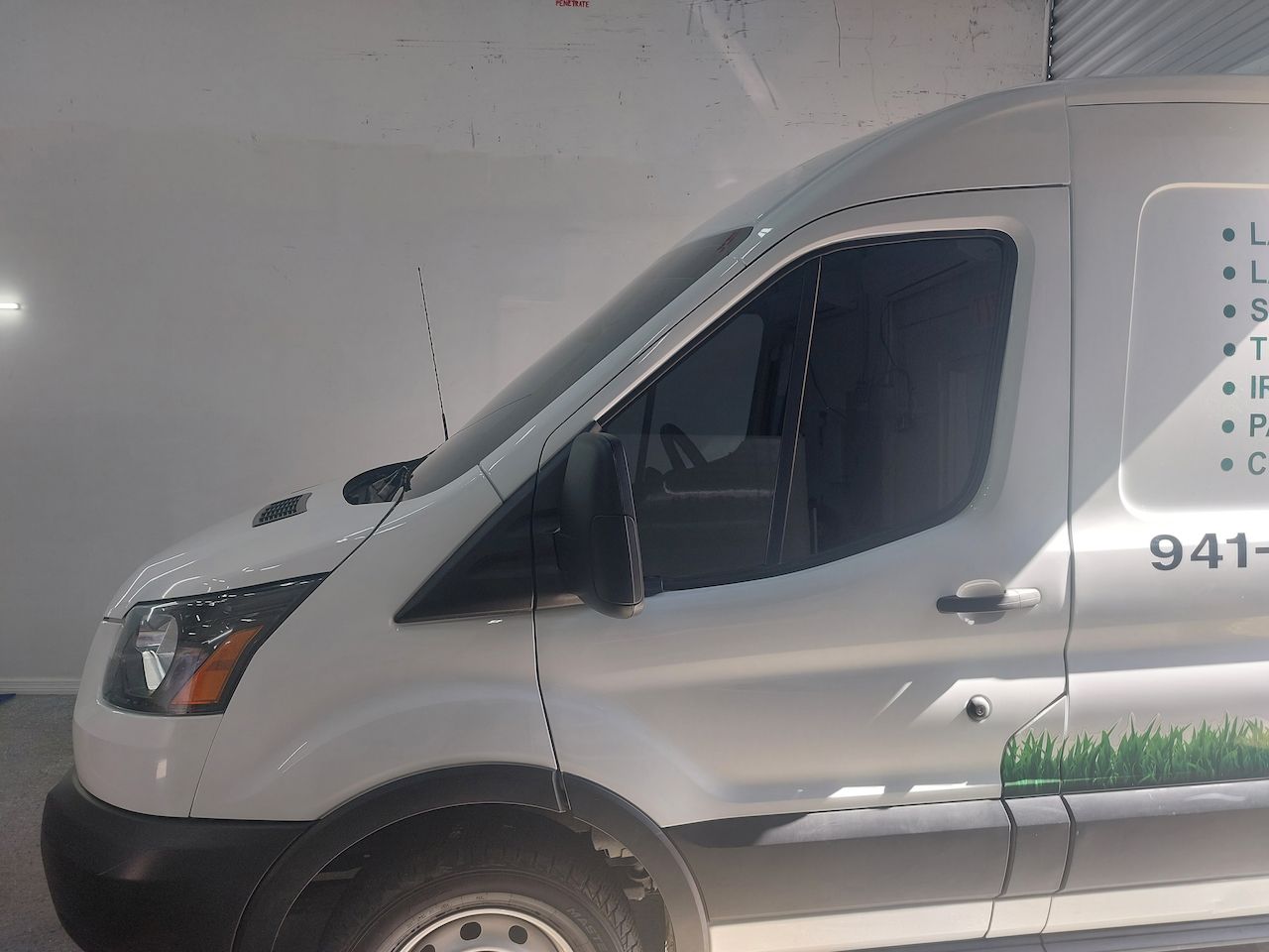 A white van with the number 941 on the side