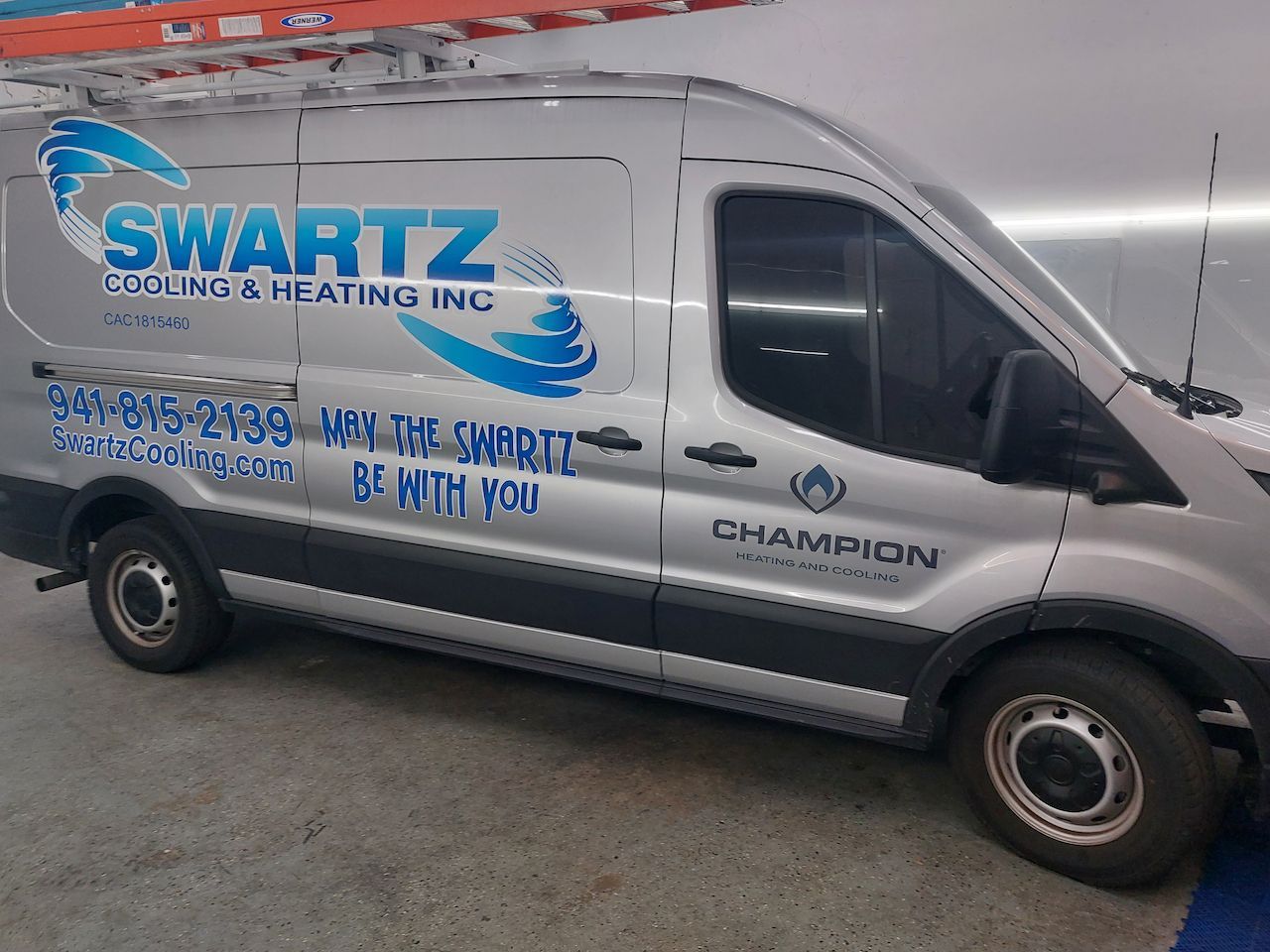 A white van with the word swartz on it