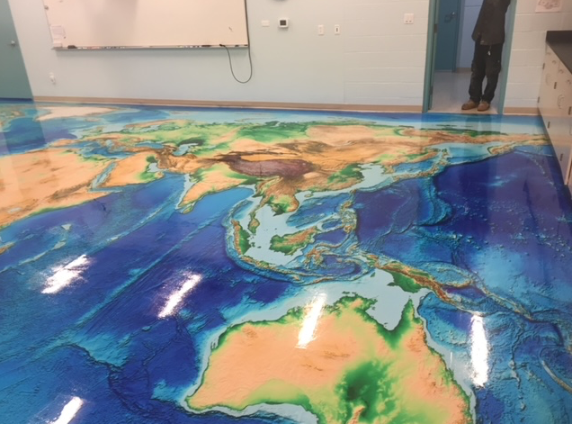A floor with a map of the world on it