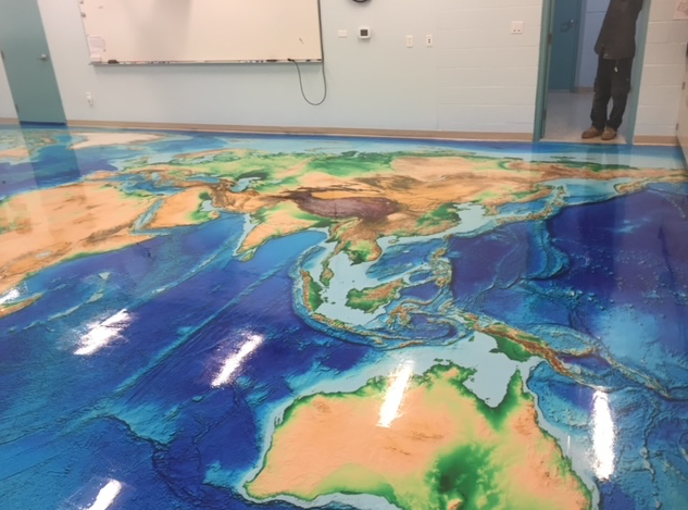 A floor with a map of the world on it