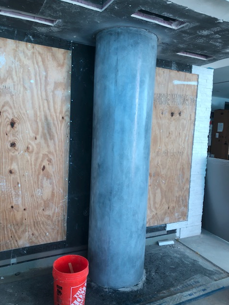 A bucket with the word home depot on it