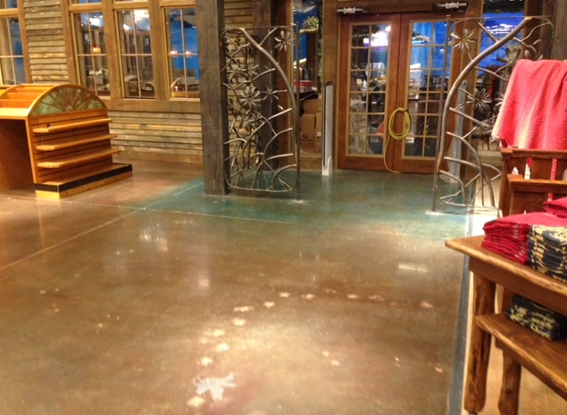 A store with a staircase going up to the second floor