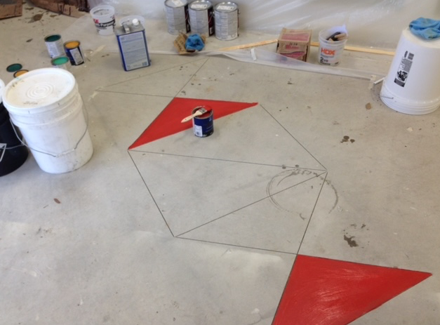 A red white and blue geometric pattern on the floor
