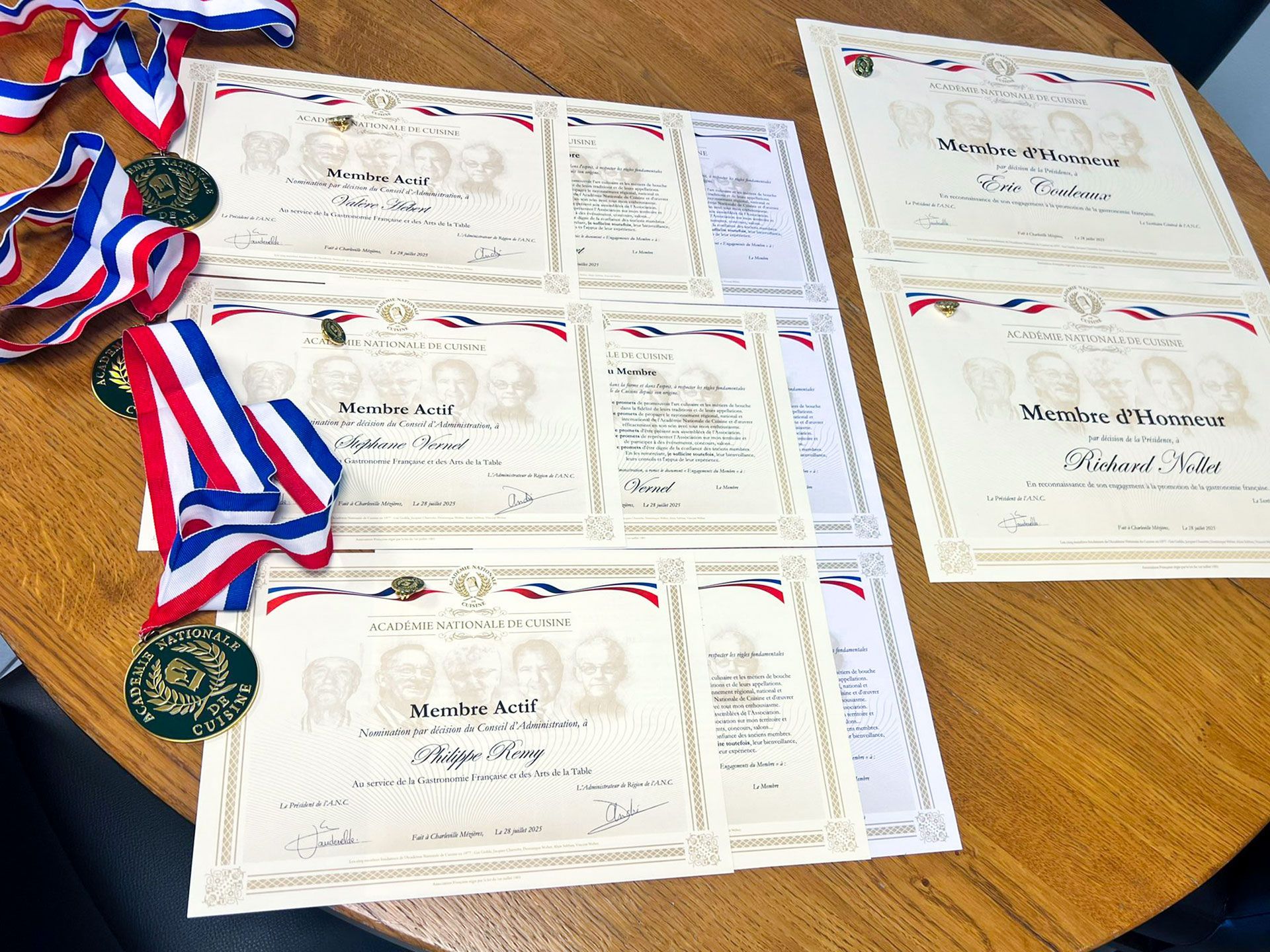 Close-up of a palm leaf with long, parallel green segments creating shadow and light patterns.