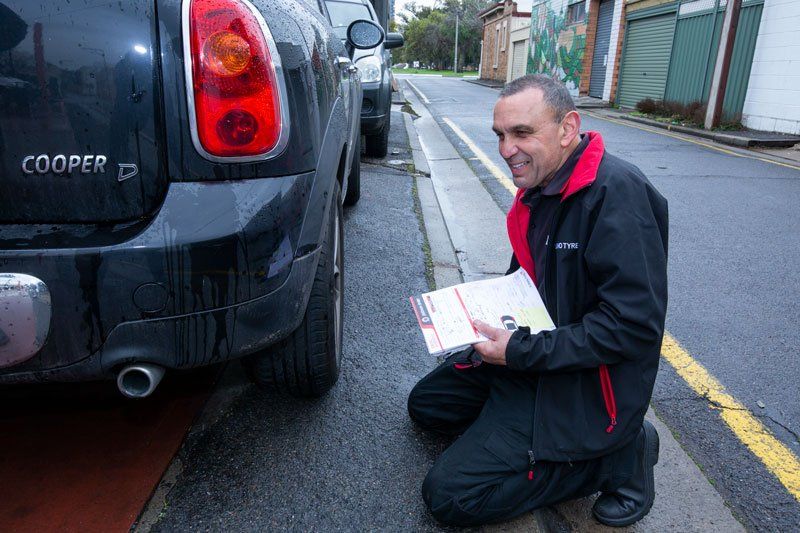 A Man Checking The Car - Adelaide, SA - Silver’s Auto Centre