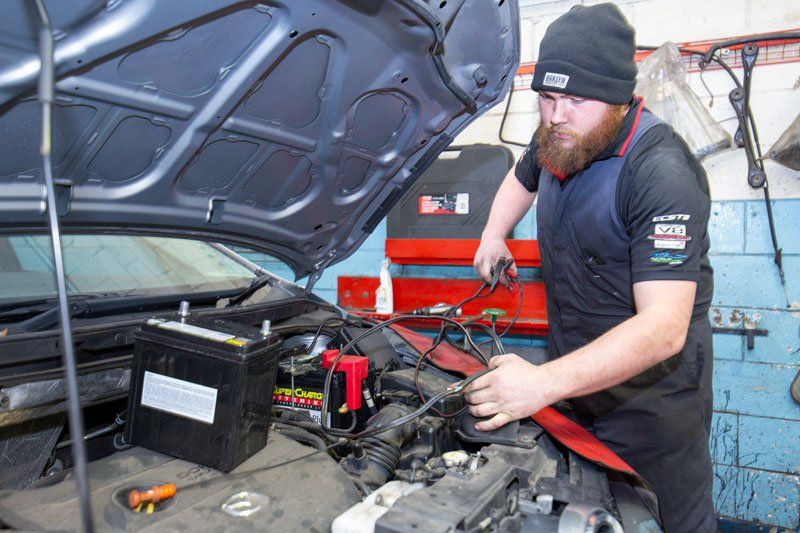 A Man Repairing A Car  - Adelaide, SA - Silver’s Auto Centre