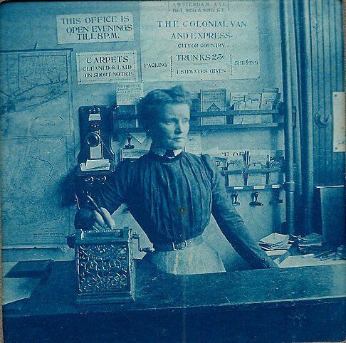 Woman on Counter of Store — Mountainside, NJ — Maxwell's Furniture Restoration