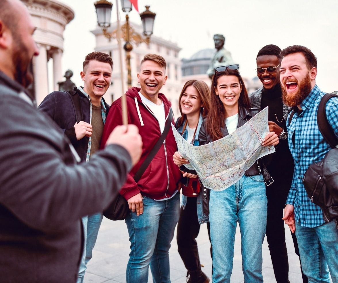 Happy group of friends in a tour Happy group of friends in a tour
