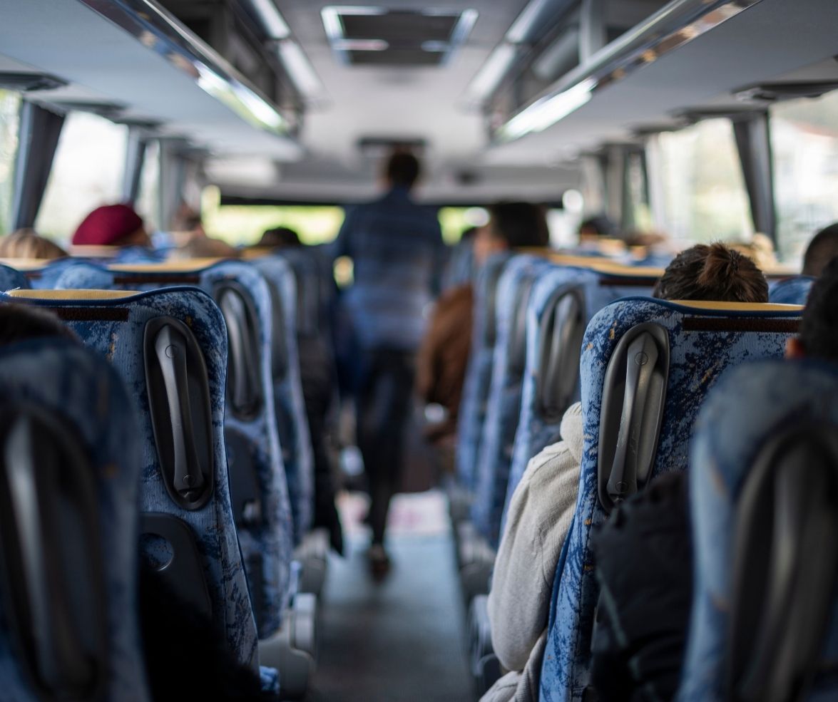 Interior view of a bus with blue seats