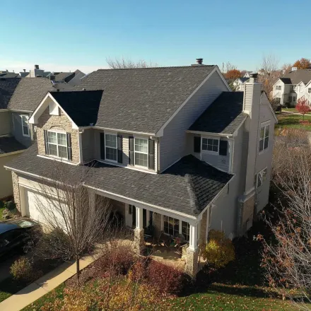 Joliet Illinois roofers near Shorewood handle multi-layer tear-offs, roof slope conversions, ridge reinforcement, and synthetic felt installations.