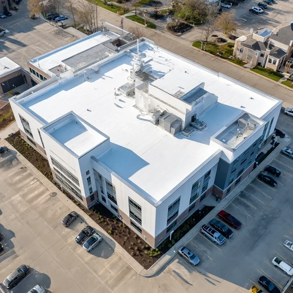 Joliet IL commercial roof sealing covers HVAC curb sealing, vent boot flashing, parapet waterproofing, and high-reflectivity coatings.