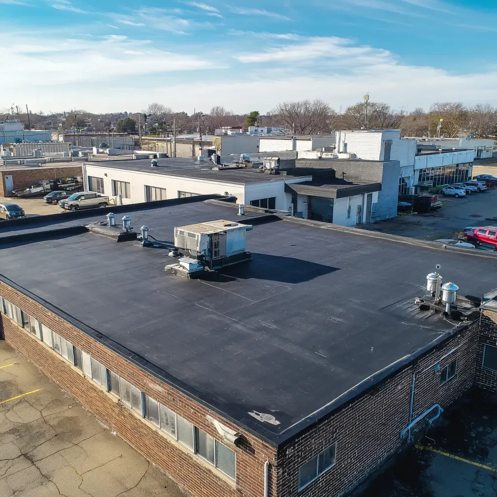 Cool roof installers Joliet IL upgrade commercial roofs with PVC reflective membranes, reflective edge sealants, and solar heat-reduction barriers.