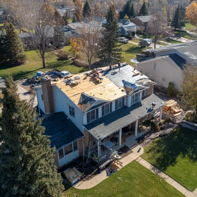 Emergency roofing Joliet IL includes tarp services, wind uplift mitigation, hail puncture repair, blown shingle replacement, and urgent roof patching.