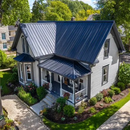 Licensed Joliet IL roofers handle roof decking rot, dormer flashing, ridge board warping, soffit vents, and seamless gutter installation services.