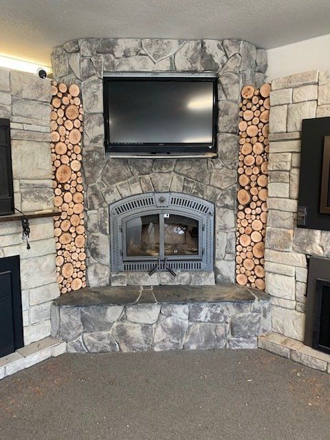 Elegant Wooden Boxed Chimney Below Television - McKinleyville, CA - Northcoast Hearth & Stoves