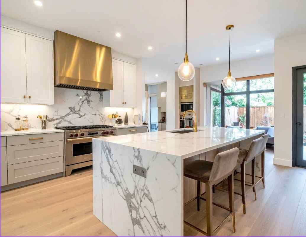 Modern kitchen island countertop with sleek waterfall edge design.