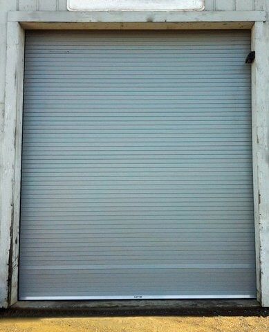 Rolling Steel Garage Door — Garage Door Service In Santa Rosa, NC
