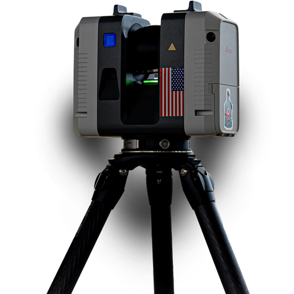 A camera with an american flag on it is on a tripod