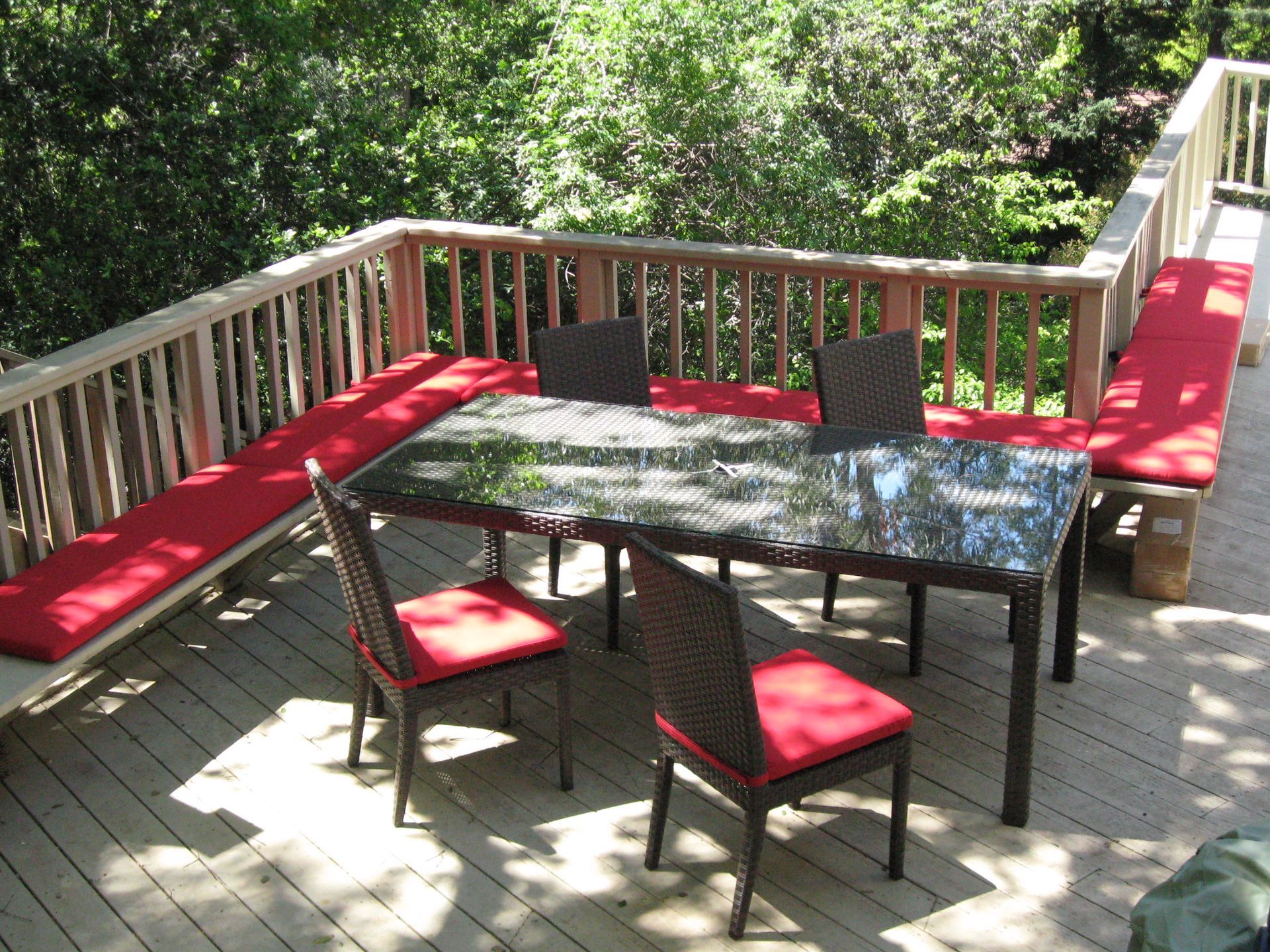 Table and Chairs on a Deck with Red Cushions — San Jose, CA — Upholstery Specialists