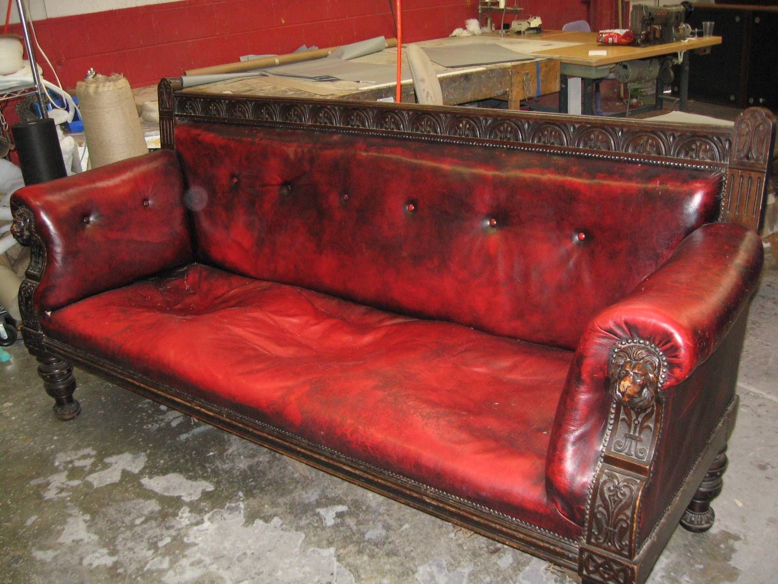 Red Leather Couch on a Concrete Floor — San Jose, CA — Upholstery Specialists