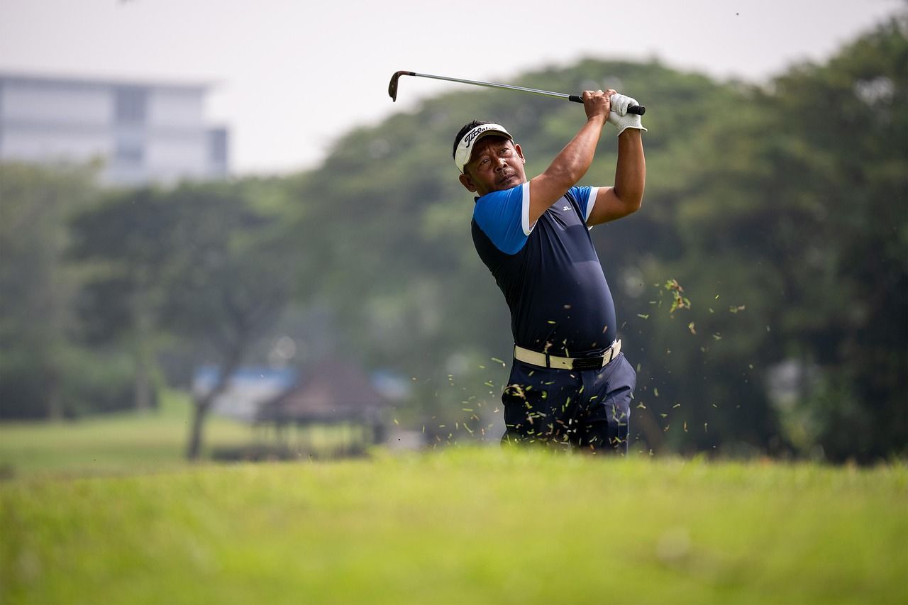 A man playing golf