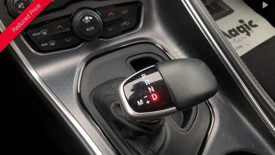 Gear shift of a car, showing P, R, N, D, and M settings.