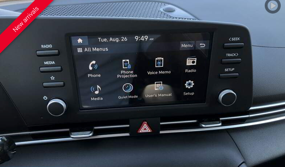 Car infotainment system display showing icons for phone, navigation, and radio. 