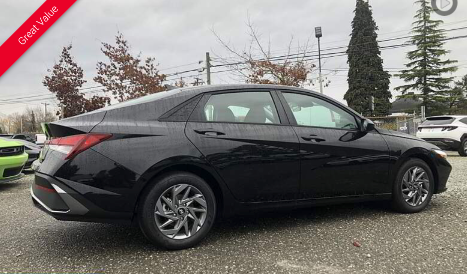 Black Hyundai sedan parked outdoors.