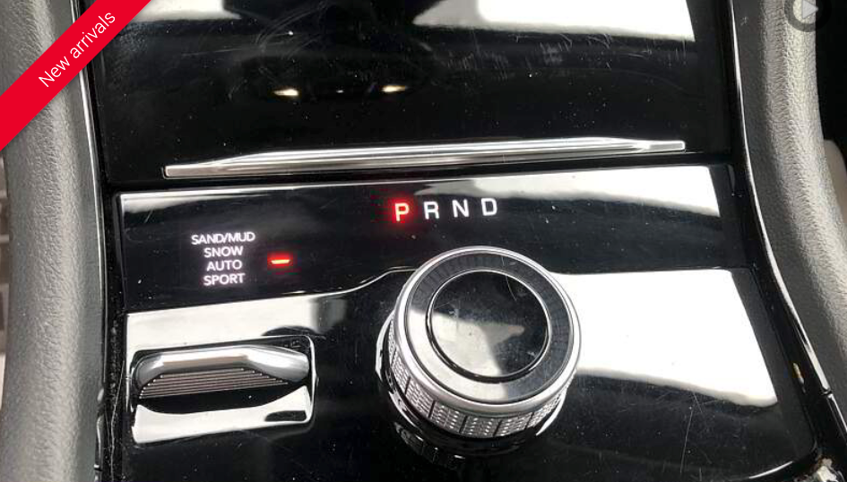Car's gear shift panel, displaying 