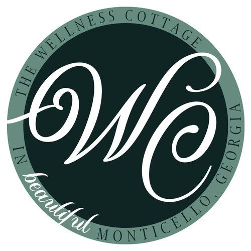 The logo for the wellness cottage in beautiful monticello georgia.