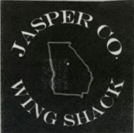A black and white logo for jasper co. living shack