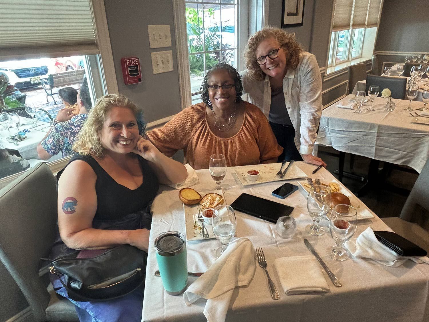 Women Sitting on a Restaurant's Table