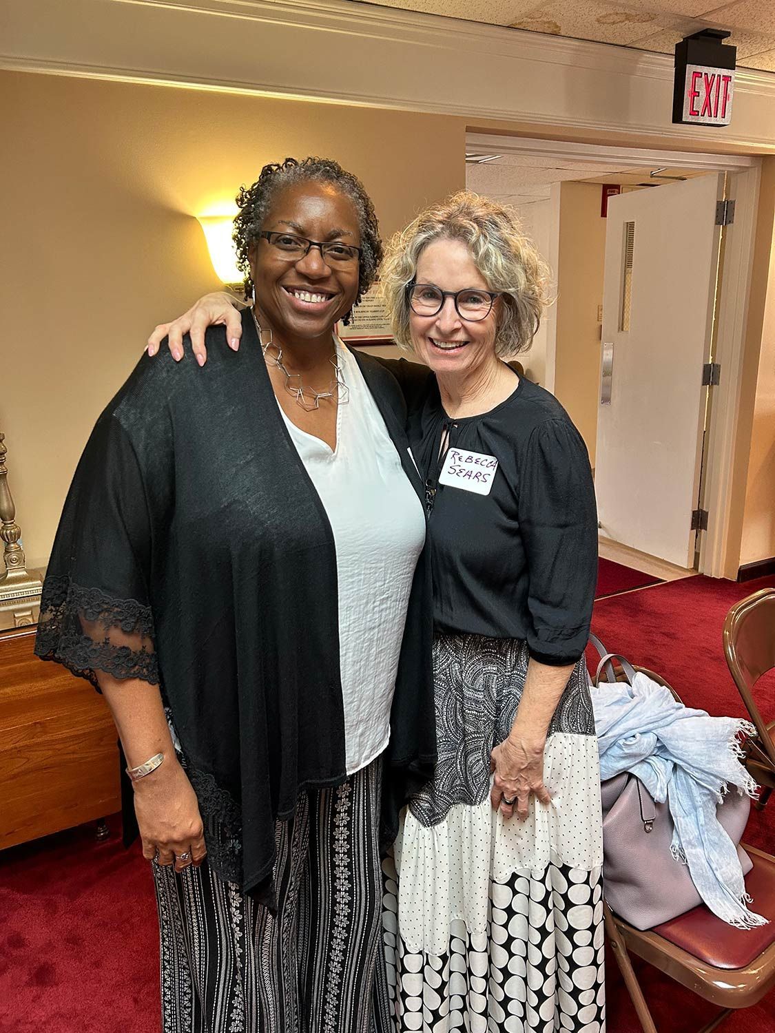 Two Women are Posing for a Picture