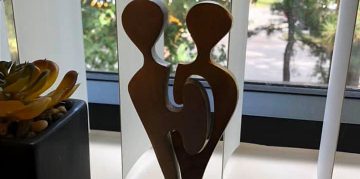 Wooden Statue of Two People