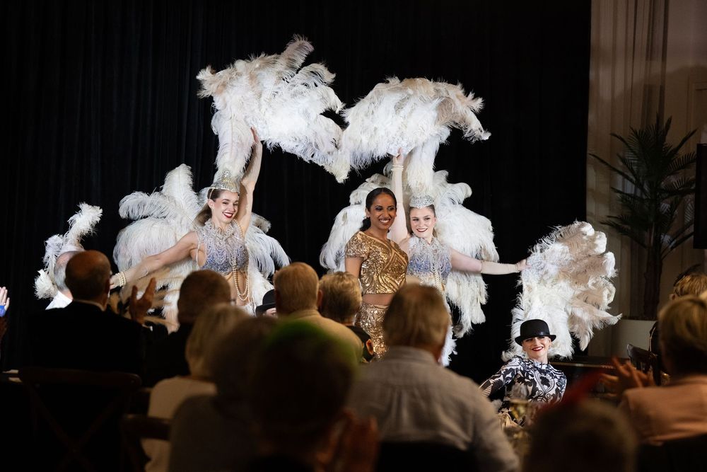 Residents watching dance show at village event