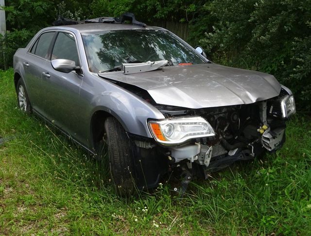 Junk car being towed away