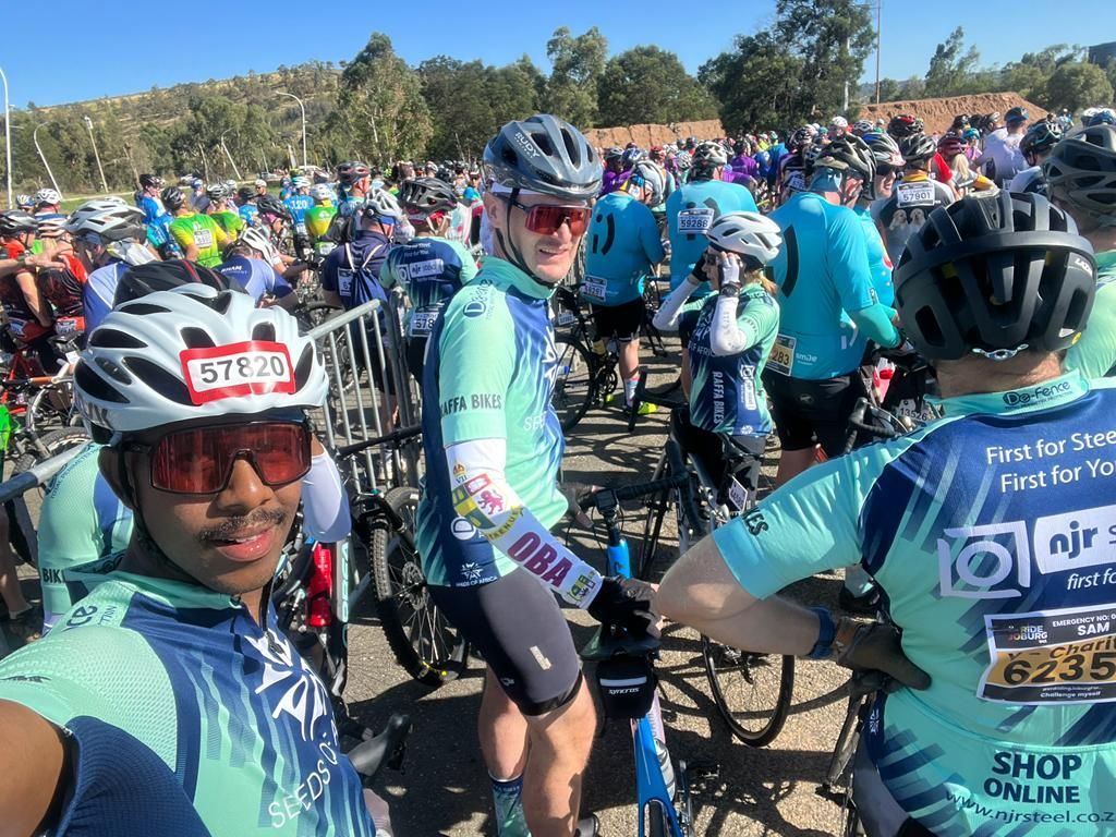 cyclists riding on behalf of seeds of africa on the start line of ride Joburg 2023