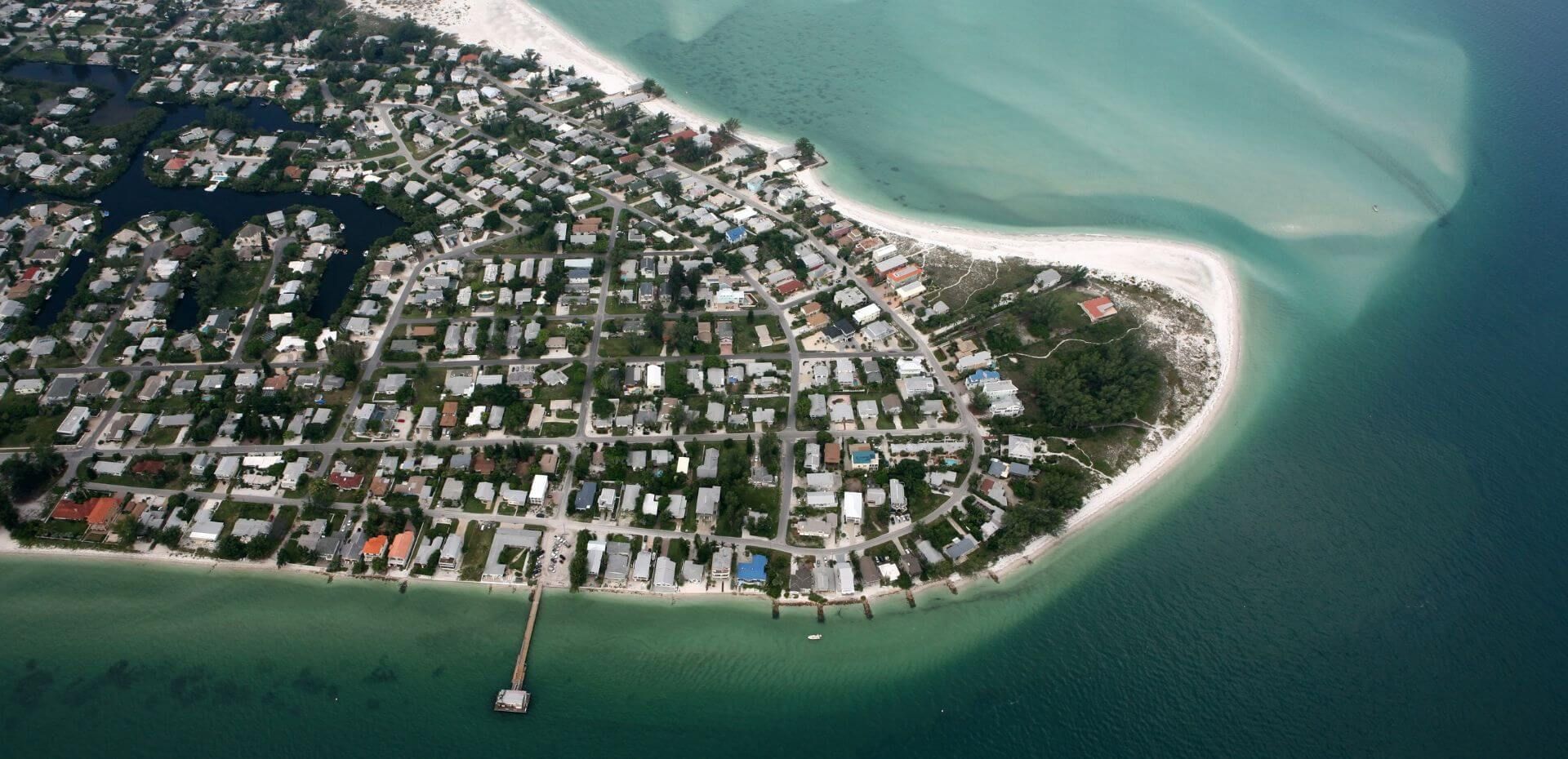 An aerial view of a small island in the middle of the ocean