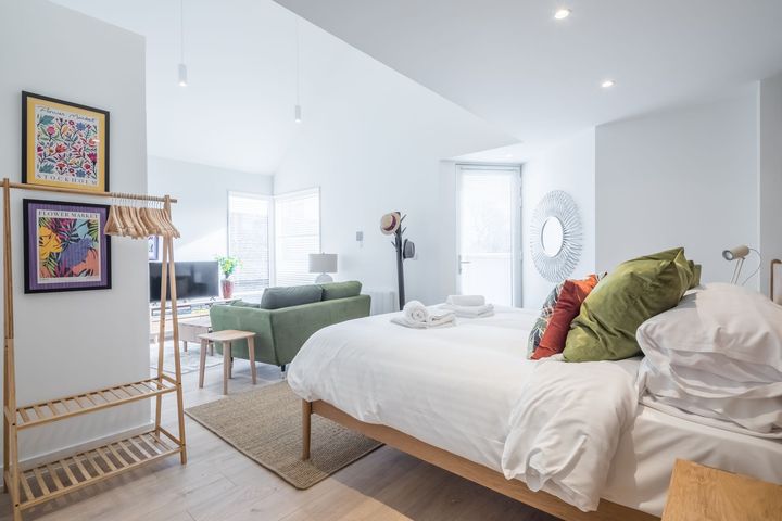 There is a large bed in the middle of the room.