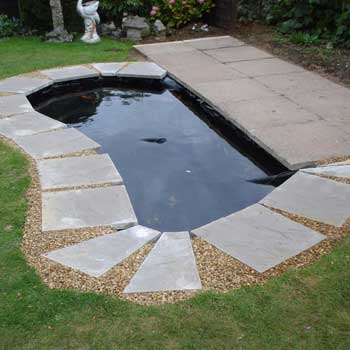 Pond with stone slabs