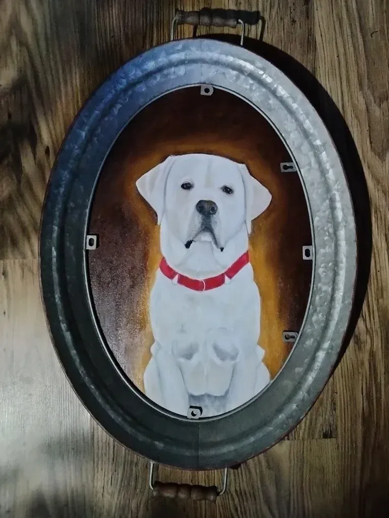 A painting of a white dog with a red collar