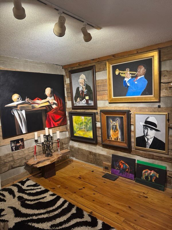 A man is playing a violin in a room with paintings on the wall.