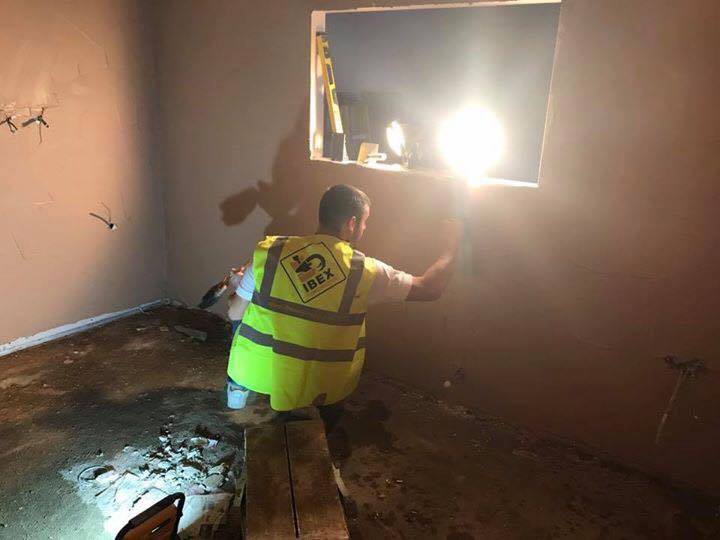 Ibex builders doing plastering 