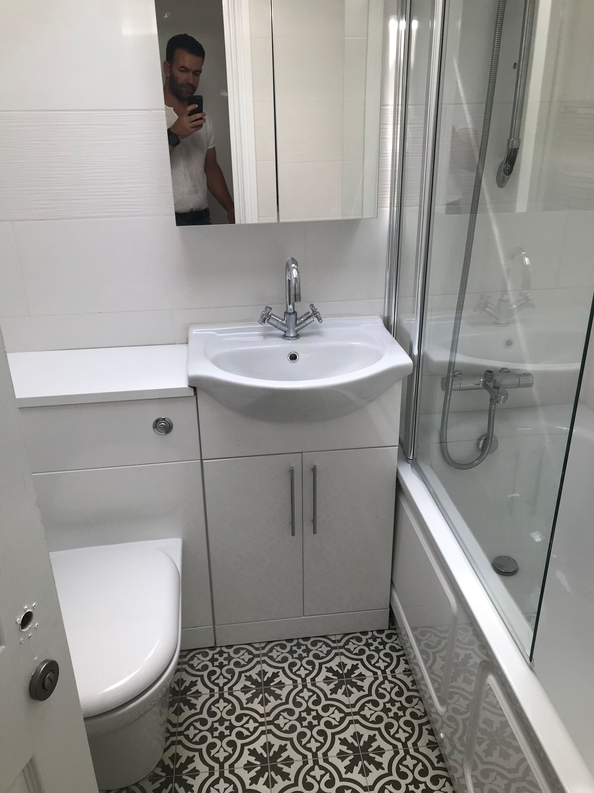 Professional bathroom fitting for a Westdown Road E15 house renovation completed by Ibex Builders.
