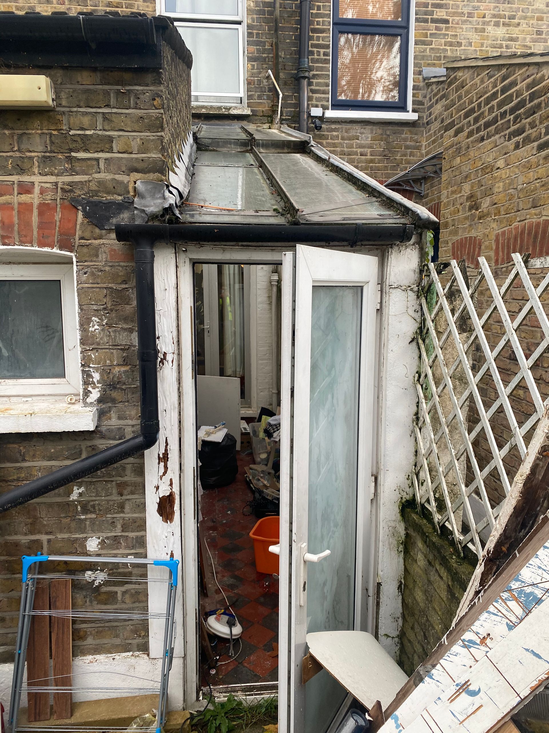 Before view: Old conservatory removal by Ibex Builders to make way for an E17 extension.